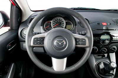 Steering wheel mounted controls, and a simple layout makes for undistracted driving. 