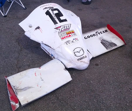 Team LMR before the race and the busted nose and front wings of the car afterwards. 